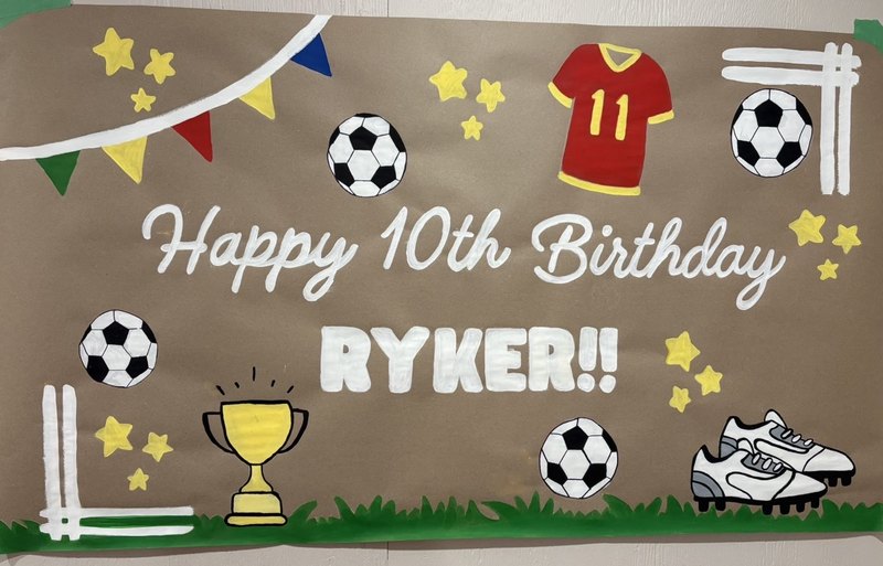 Happy 10th Birthday Ryker soccer-themed banner